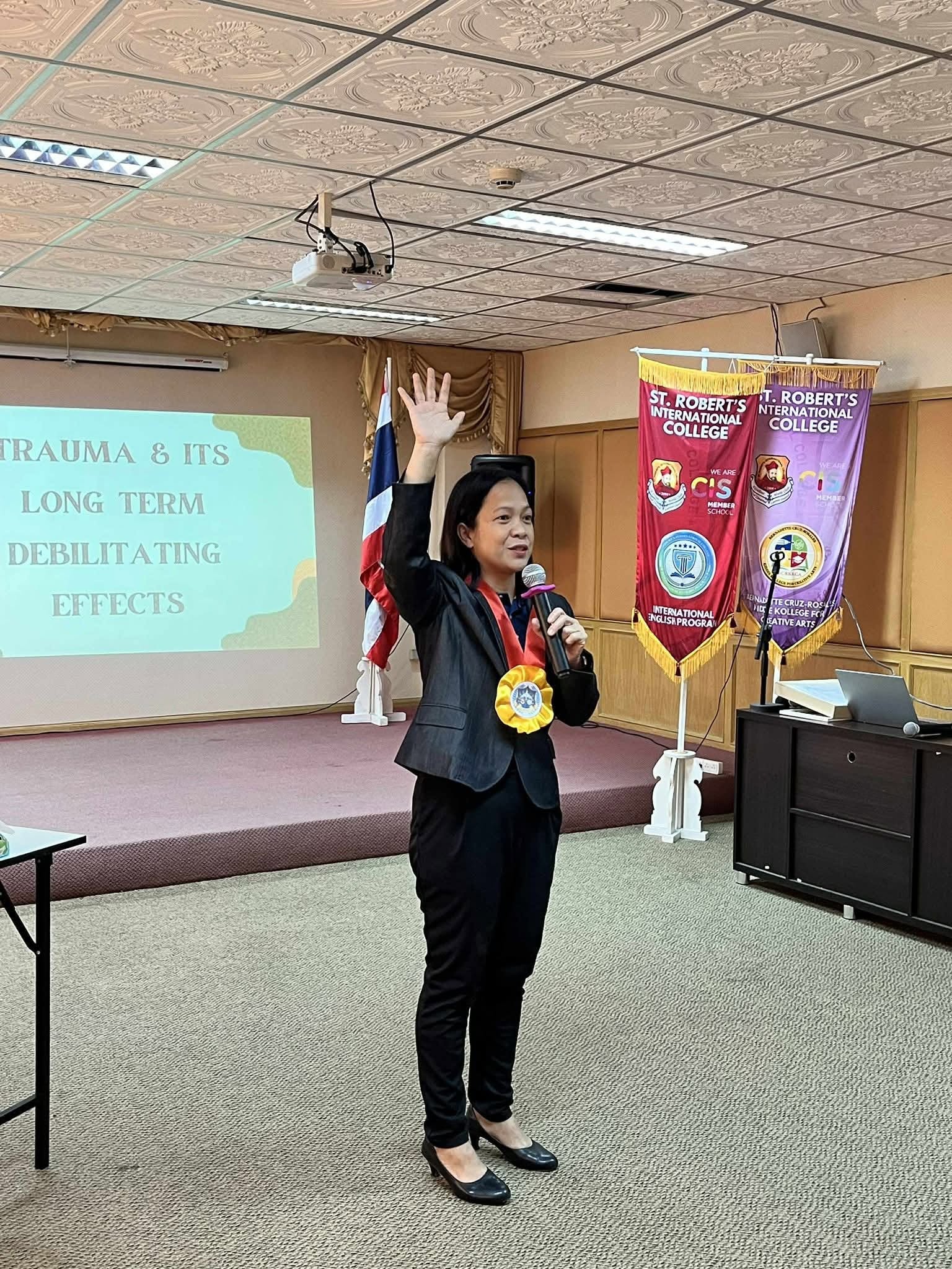 Ruth passionately speaking about trauma and its long-term effects